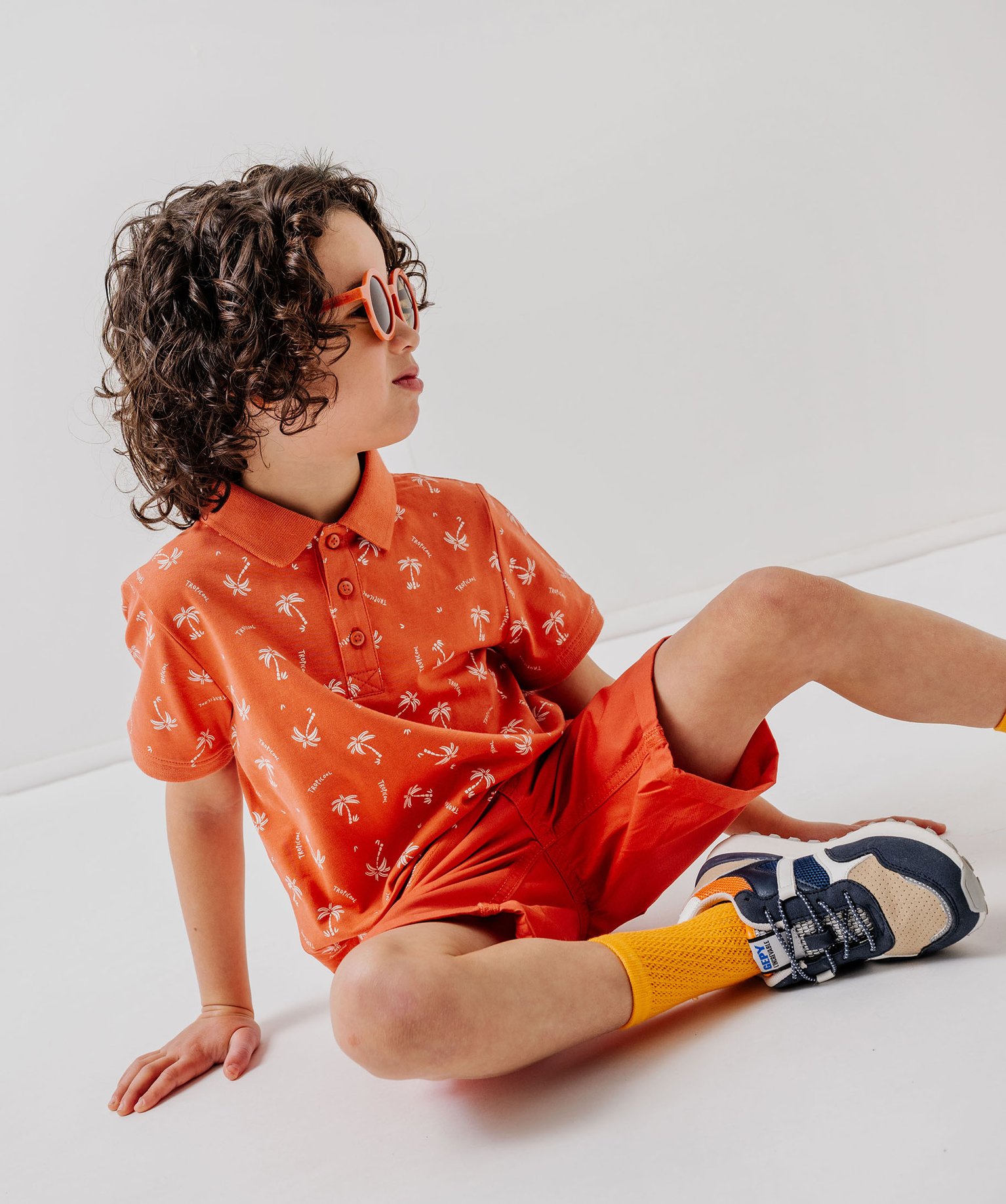 Polo manches courtes à motif exotique garçon - 12 - orange - GEMO