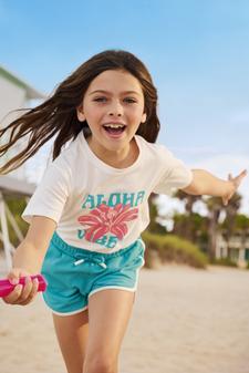 Tee-shirt manches courtes coupe oversize avec motif pailleté fille vue1 - GEMO (ENFANT) - GEMO